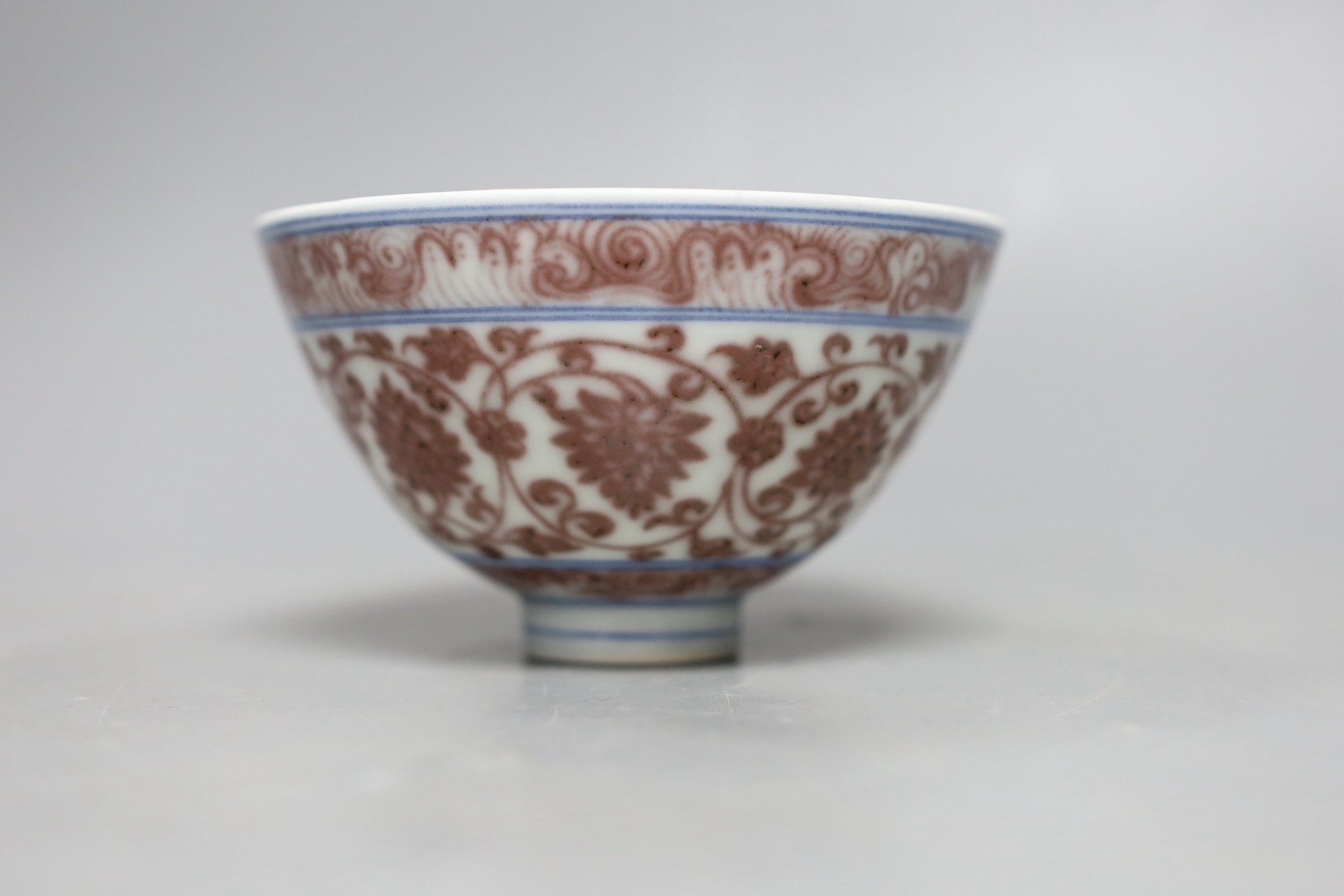 A small Chinese underglaze copper red bowl, 7.5cms high